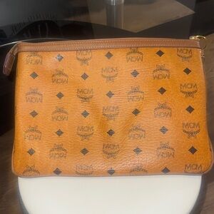 MCM Cognac wristlet with Logo Pattern